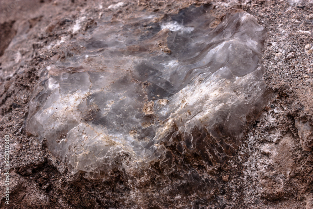 Obraz premium Volcanic red soil texture with sea salt