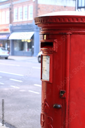 image of an old-fashioned red post in London town