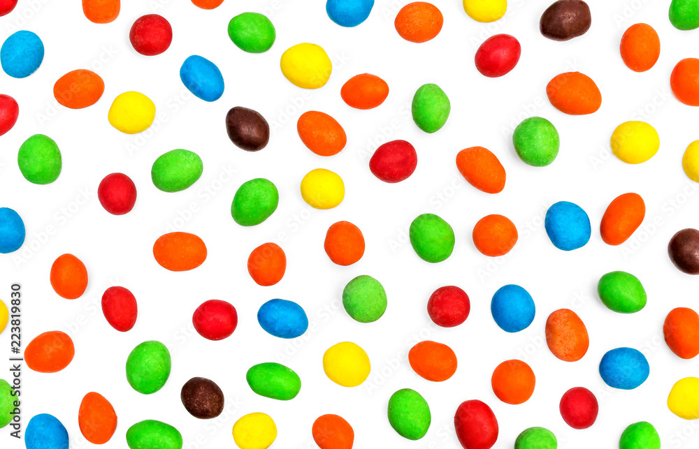 Background from colorful round candy on white. Background from colorful round candy on white.