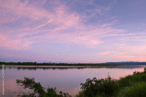 Atmosphere sunrise at the Mekong river is bordered by Thailand and Laos