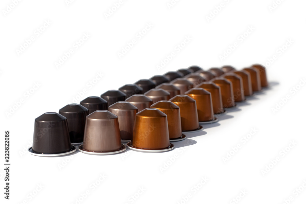 Coffee capsules in tree lines on a white background isolated Coffee capsules in tree lines on a white background isolated