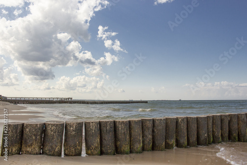 background, wooden breakwaters by the sea