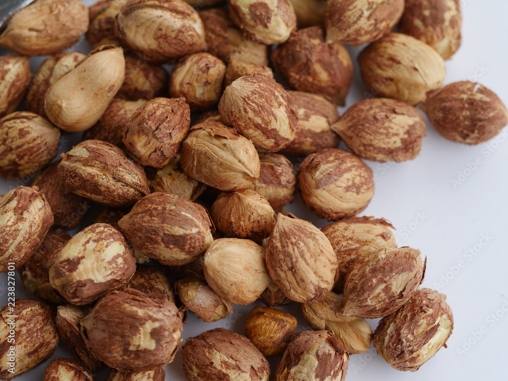 Fresh hazelnuts cores on a white background Fresh hazelnuts cores on a white background