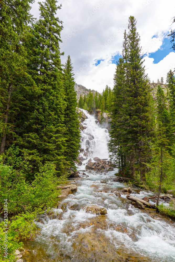 Waterfall at lake jenny, grand teton national park, wyoming, usa Waterfall at lake jenny, grand teton national park, wyoming, usa
