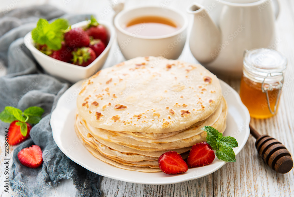 Delicious pancakes with strawberry Delicious pancakes with strawberry
