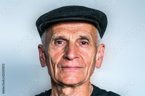 Close-up of a man wearing a cap