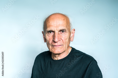 Portrait of a sad, upset elderly man
