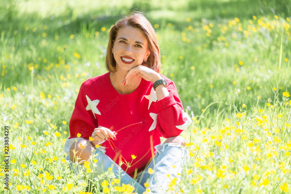 Pretty girl siiting on grass Pretty girl siiting on grass