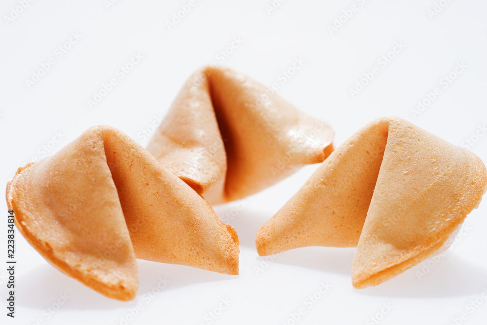 Three surprise fortune cookies isolated on white background Three surprise fortune cookies isolated on white background