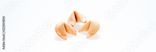 Foto Three surprise fortune cookies isolated on white background