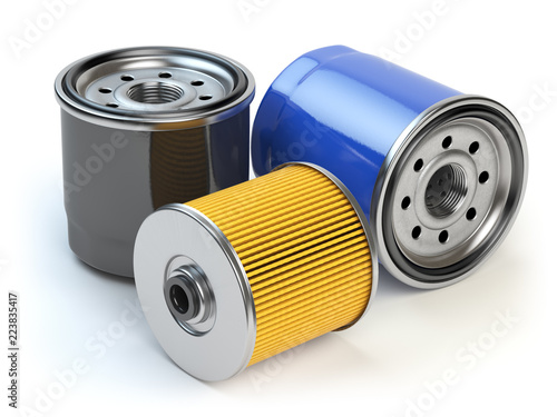 Car oil filter isolated on white background. Automobile spare part photo