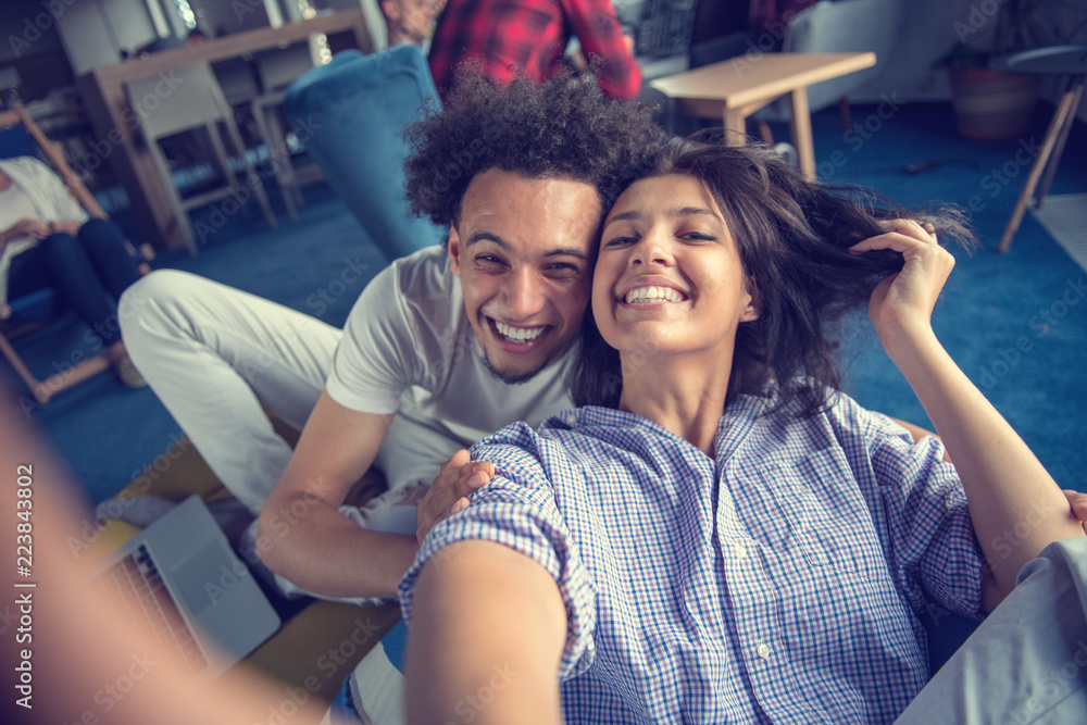 Fototapeta premium Group of happy smiling businesspeople making selfie and gesturing.