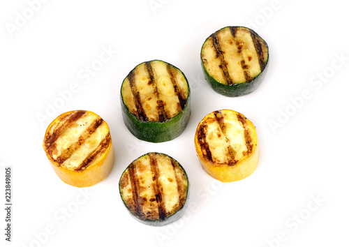 green and yellow zucchini on a grill