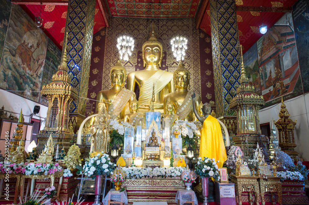 Lampoon, Thailand - June 3, 2018 :  portrait of the beautiful Buddha statues in the temple of Wat Prathat Hariphunchai