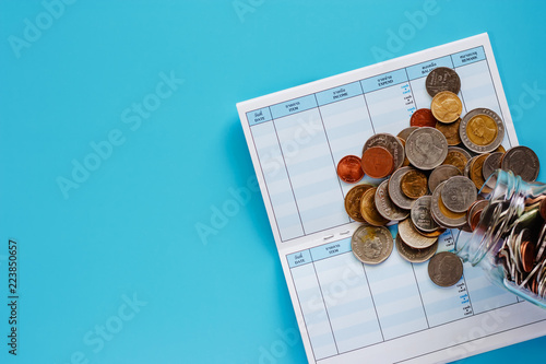 Coins in glass jar and outs...