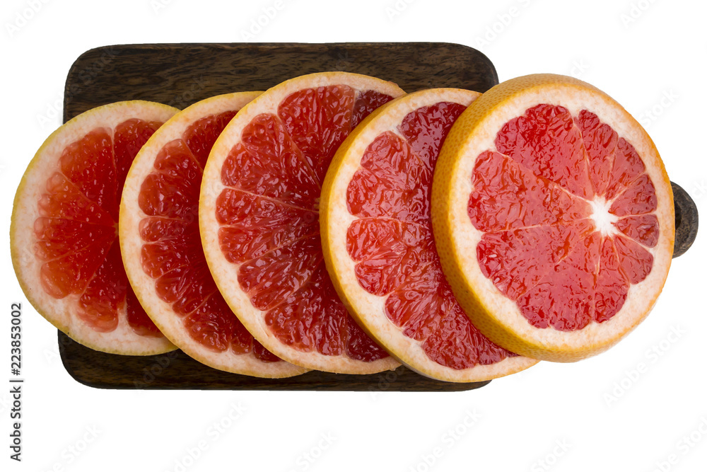 Grapefruit slices, fresh juicy slices. Top view. Grapefruit slices, fresh juicy slices. Top view.