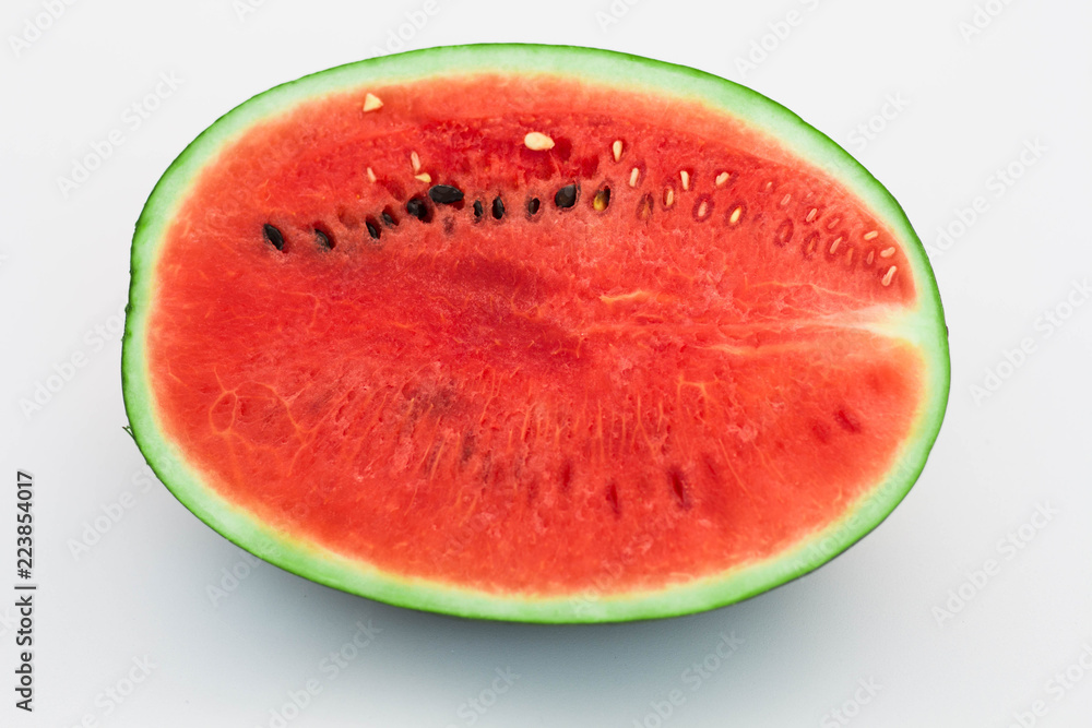 Half of watermelon isolated on white background Half of watermelon isolated on white background