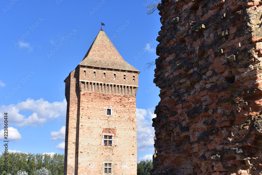 old fortress and its tower with sky in the background
