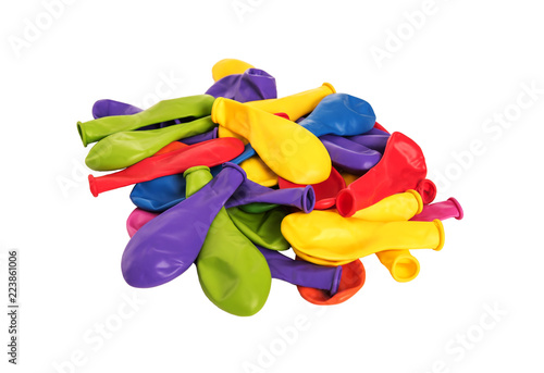 Pile of multi-colored balloons on a white background.