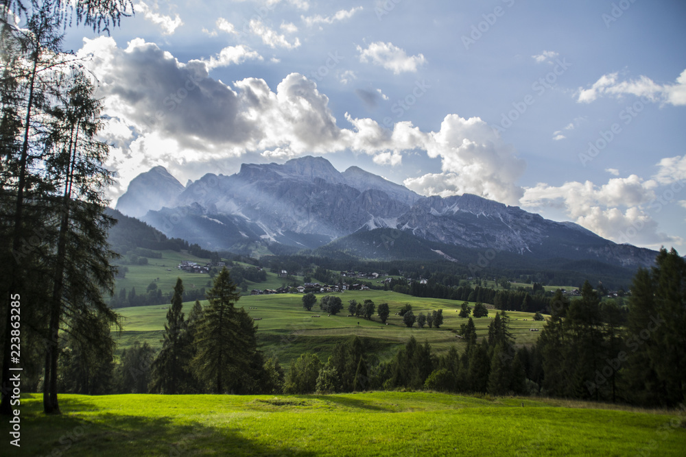 Scenic landscape view of Cortina D´ampezzo alpine village and highest mountains in Dolomites, Italy in summer. Popular tourist destination/attraction for active family holiday. 