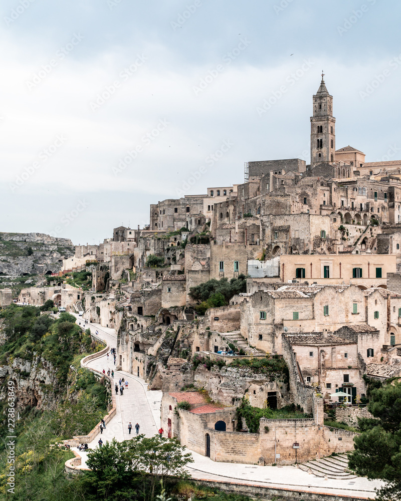 Tourists walking in Matera Italy