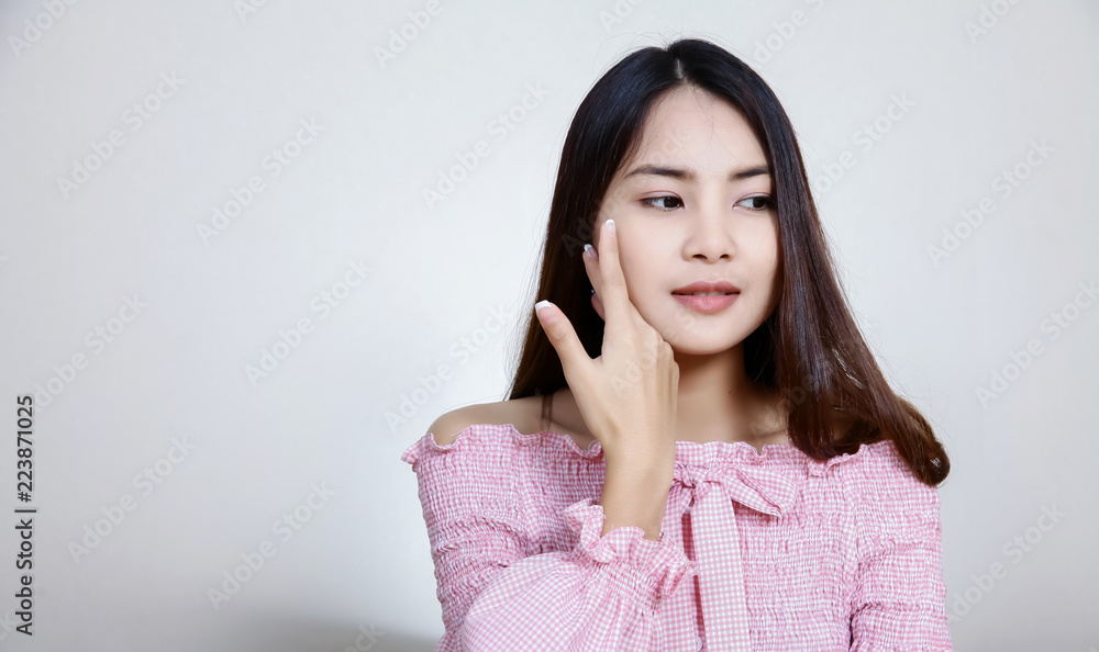 Beautiful Asian girl with healthy skin . Skincare concept. Beautiful Smiling Young Asian Woman with Clean, Fresh, Glow, and perfect Skin. Happy, healthy, cheerful, relaxing girl in white living room. Beautiful Asian girl with healthy skin . Skincare concept. Beautiful Smiling Young Asian Woman with Clean, Fresh, Glow, and perfect Skin. Happy, healthy, cheerful, relaxing girl in white living room.