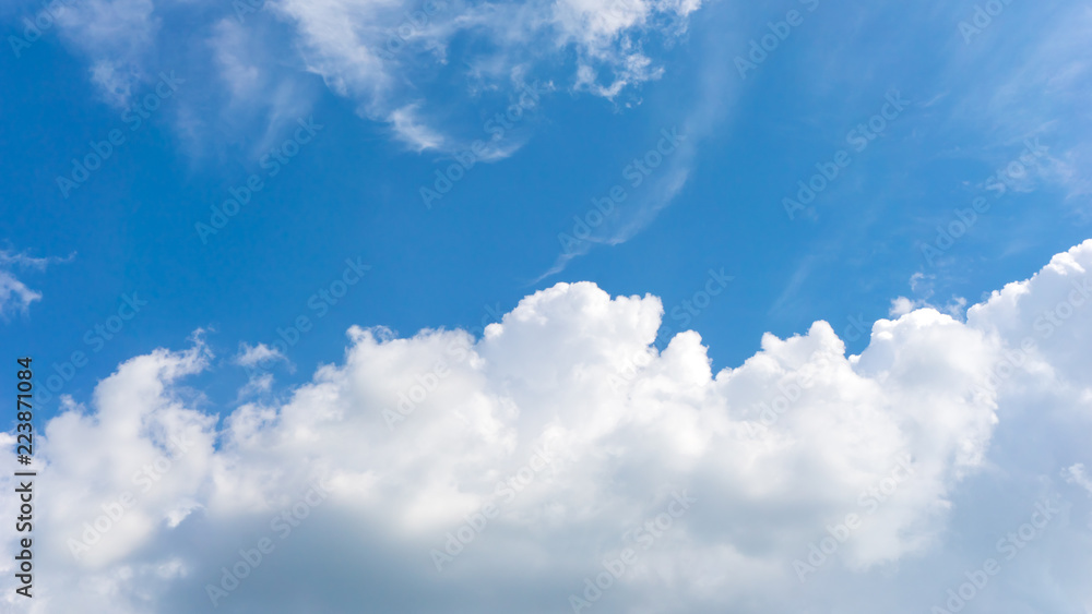 Blue sky and beautiful cirrus clouds on a sunny day, background texture Blue sky and beautiful cirrus clouds on a sunny day, background texture