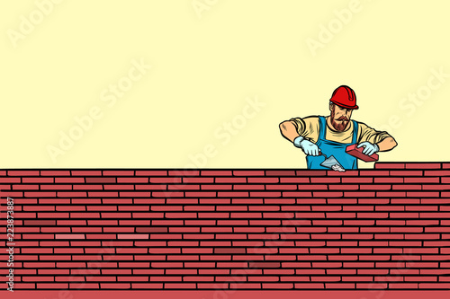 The Builder lays brick masonry in the middle