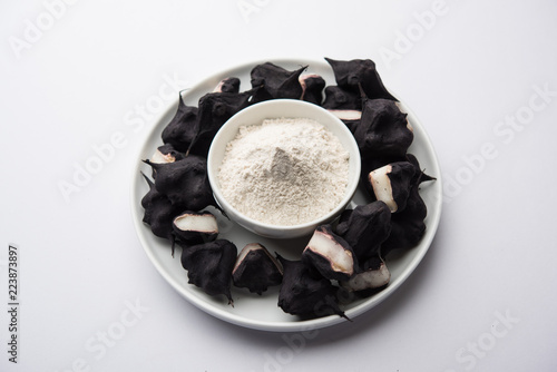 cooked Water chestnut with flour or powder, also known as singada/singara or shingada peeth, selective focus photo