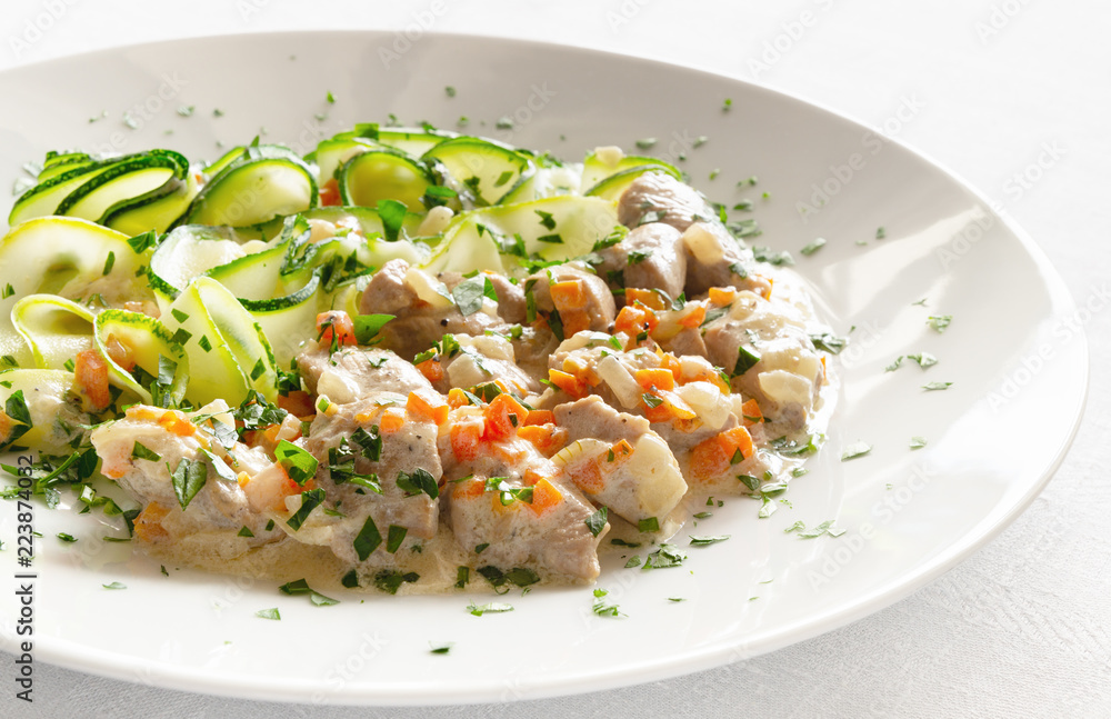 turkey ragout with onion, carrot, white wine, and sour cream garnished with parboiled marrow strips turkey ragout with onion, carrot, white wine, and sour cream garnished with parboiled marrow strips