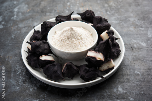 cooked Water chestnut with flour or powder, also known as singada/singara or shingada peeth, selective focus photo