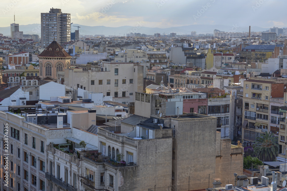 Rooftops and view of commercial and residential buildings in Barcelona Spain