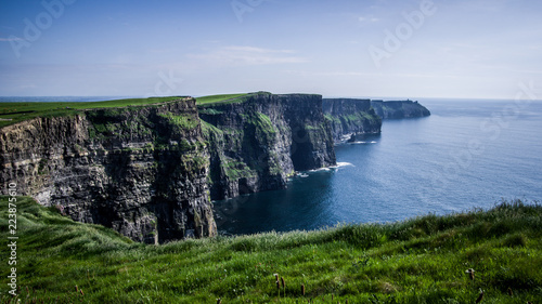 Landscape view of Cliffs of Moher with clear day sky. County Clare, Ireland.