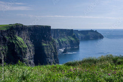 Landscape view of Cliffs of Moher with clear day sky. County Clare, Ireland.