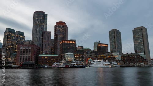 Boston Skyline from Fan Pier Park Day to Night Sunset Timelapse photo