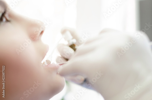 Dentist giving anesthesia