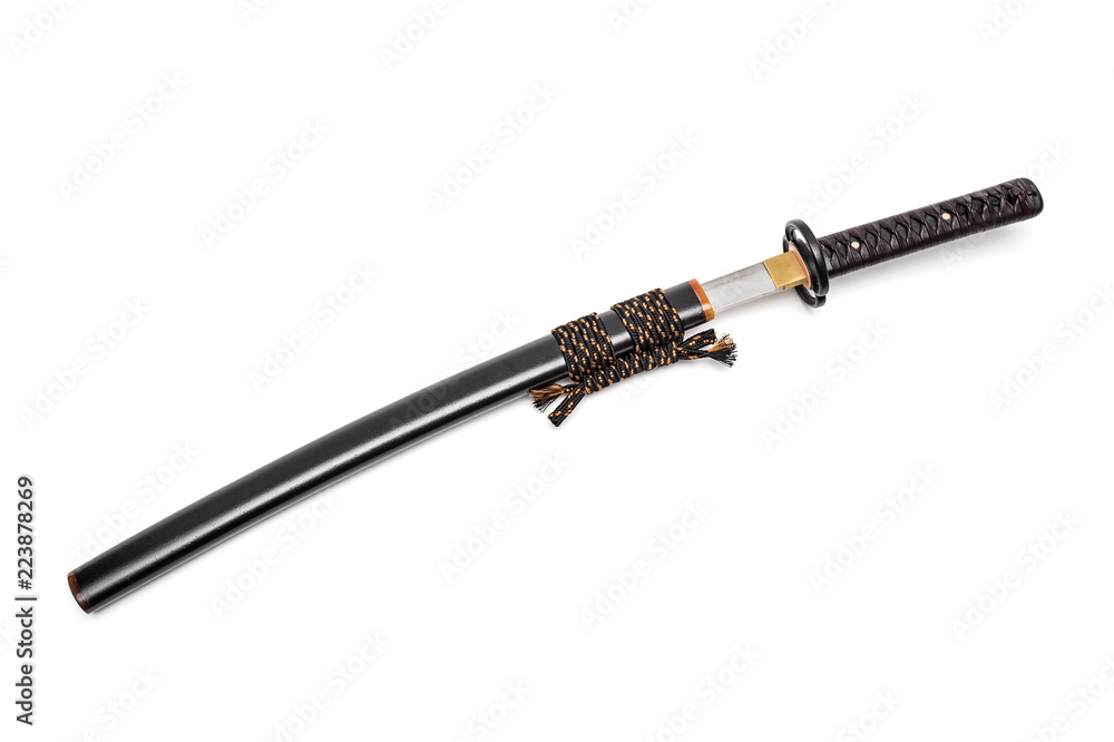 Brown leather cord tie on grip Japanese sword steel fitting and black scabbard on white background. Brown leather cord tie on grip Japanese sword steel fitting and black scabbard on white background.