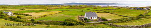 Farms with meadow and Liscannor village in background