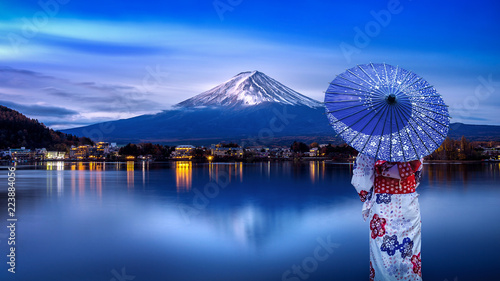 Fotografie, Tablou Asian woman wearing japanese traditional kimono at Fuji mountain, Kawaguchiko lake in Japan