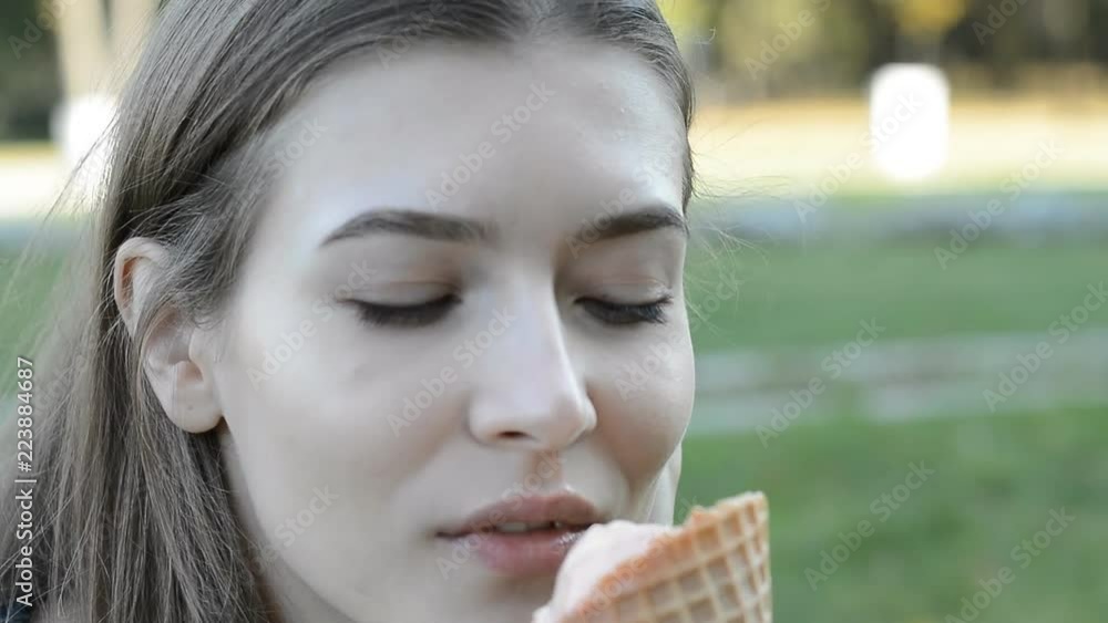 portrait of a young beautiful woman with ice cream portrait of a young beautiful woman with ice cream