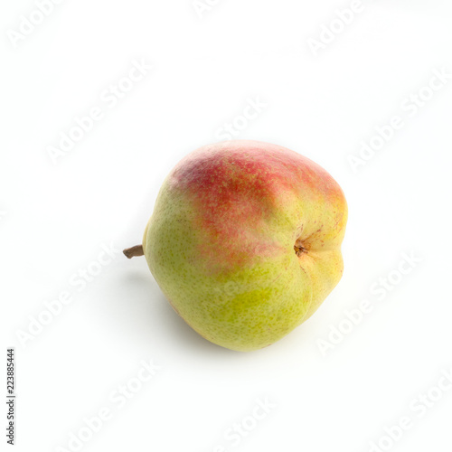 yellow ripe pear on white background