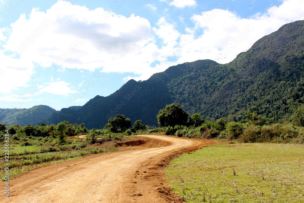 Country roads at Vang Vieng, Laos : The view of two side filled with beautiful mountains