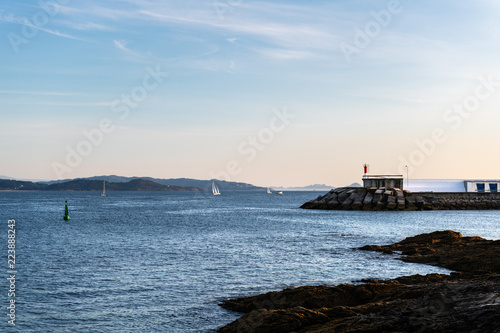 Cliffs and small lighthouse in Pontevedra, Spain