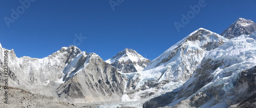 Amazing Shot Panoramic view of Nepalese Himalayas mountain peaks covered with white snow attract many climbers, some of them highly experienced mountaineers