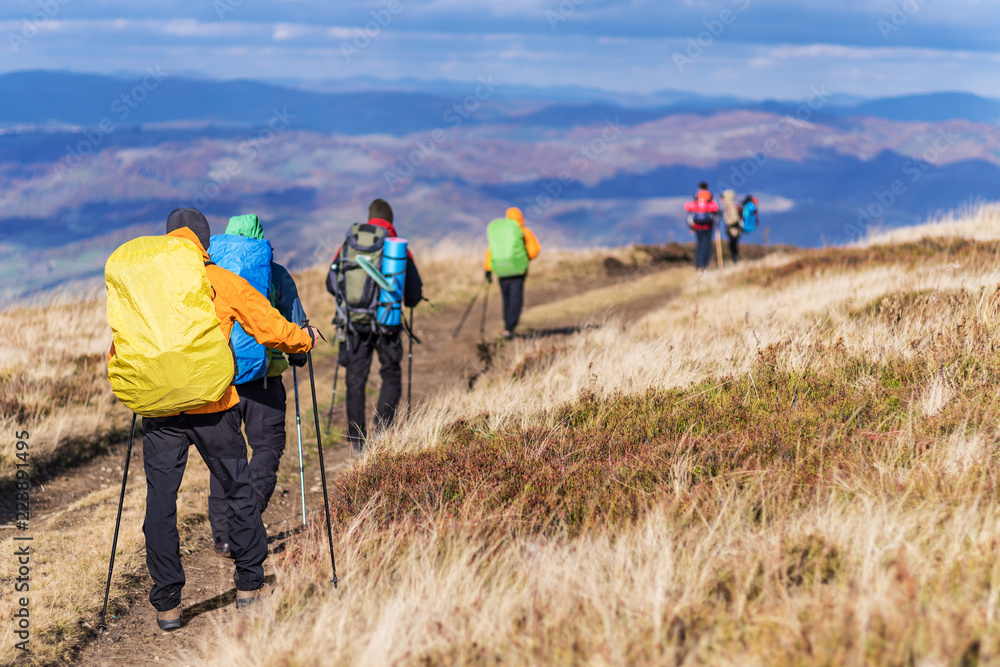 Group of tourists are trekking in the mountain. Group of tourists are trekking in the mountain.