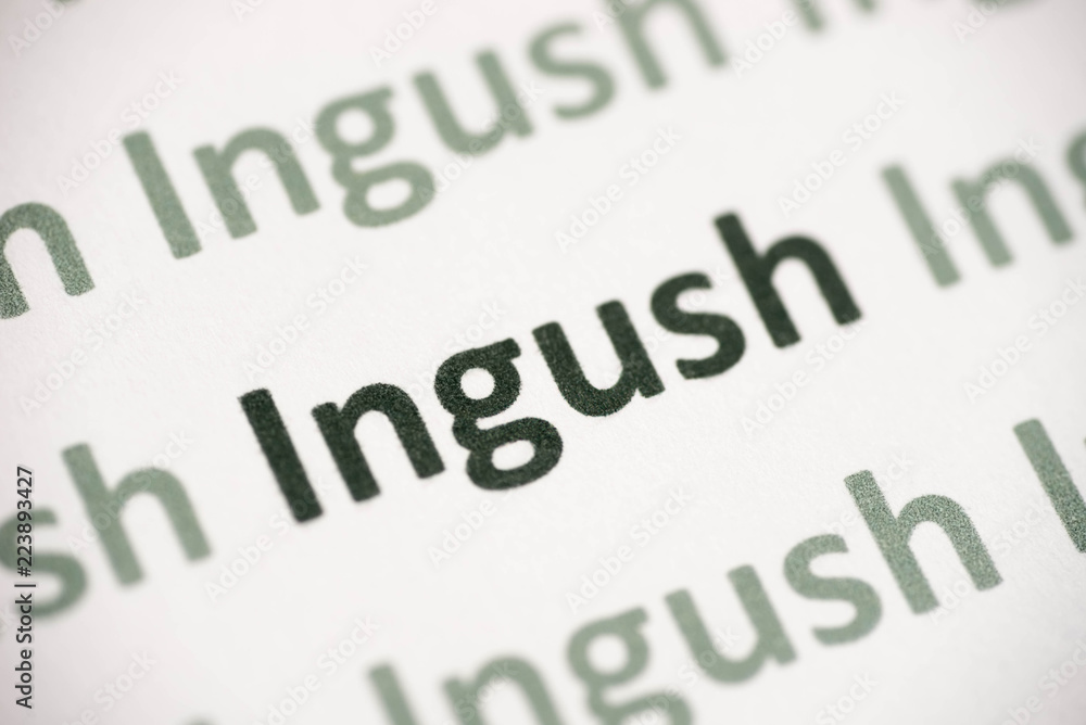 word Ingush language printed on paper macro word Ingush language printed on paper macro
