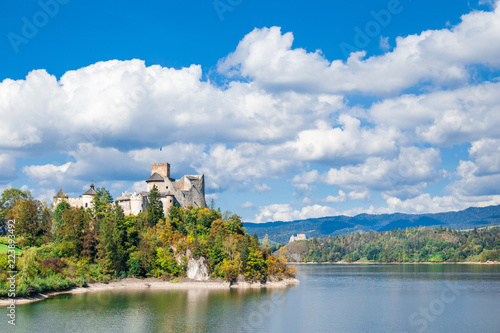 Fototapeta Naklejka Na Ścianę i Meble -  Nidzica old castle and lake in Poland. Landmark visited by many tourists.