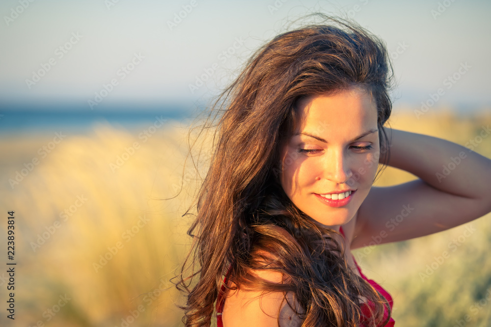 Outdoor portrait of attractive young woman enjoying evening sun Outdoor portrait of attractive young woman enjoying evening sun