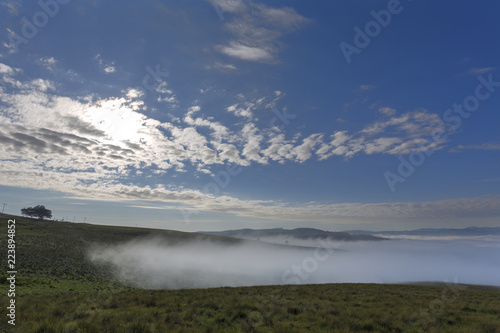 Wind blow mist up the valley