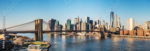 Brooklyn bridge and Manhattan at sunny day, New York City photo